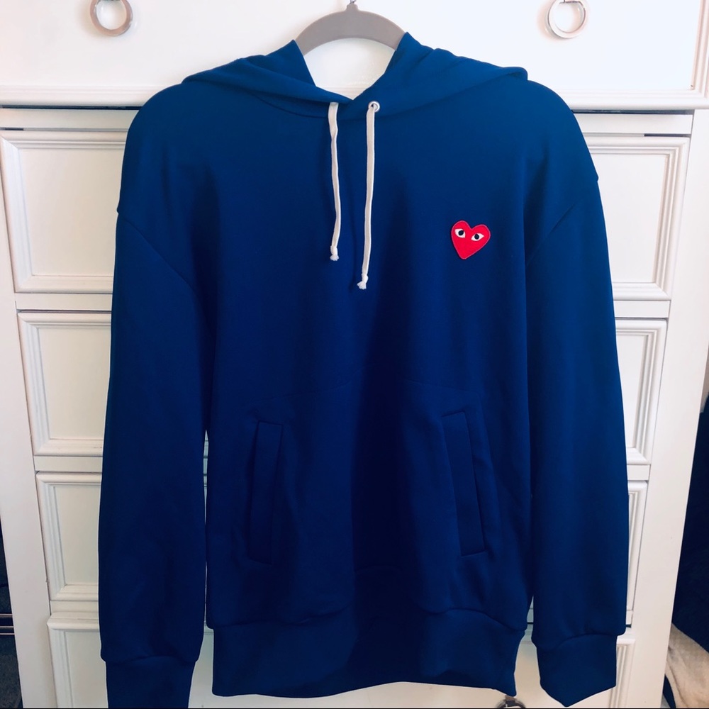 Comme des Garçons
Play Hooded Sweatshirt in Navy